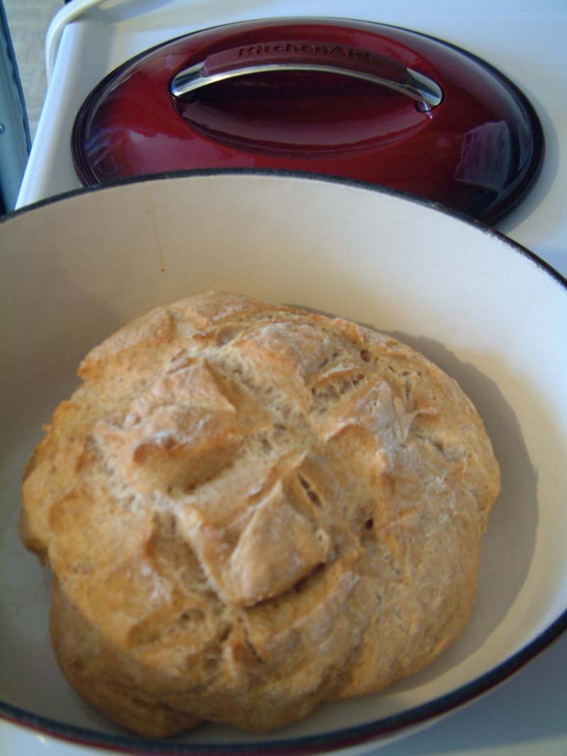 French boule bread baked in a cast iron pot
